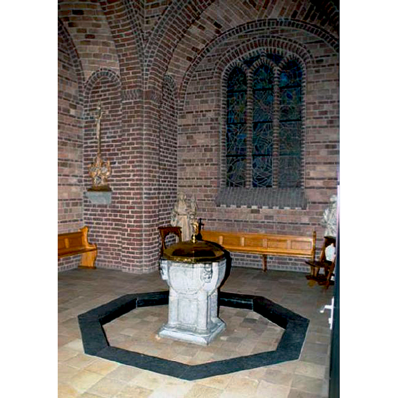 the font and cover in the baptistery chapel, to the right of the main entranceway