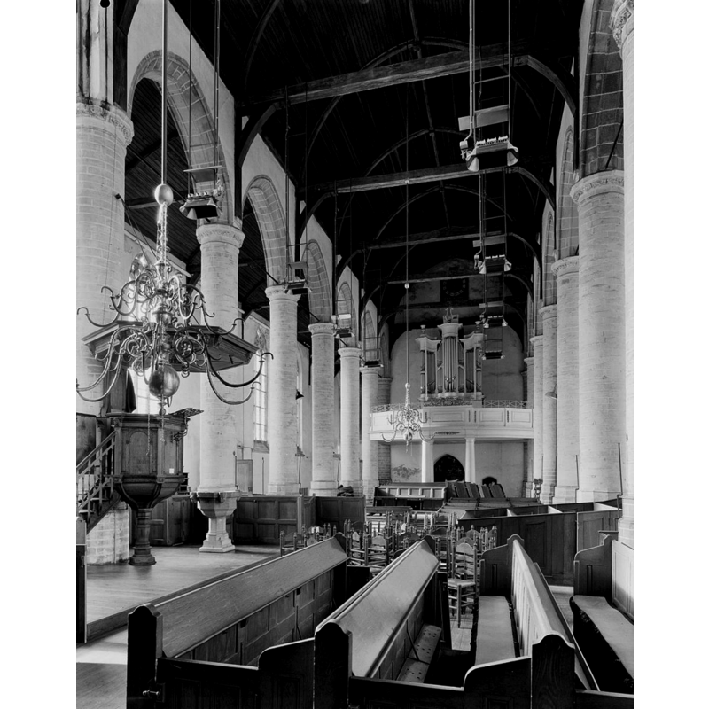 the font by the pulpit, in the nave, looking west