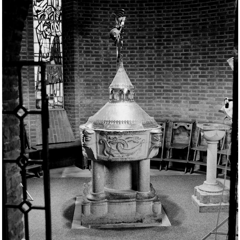 the old font and cover in the new church in 1996; they survived the destruction of the church in 1944