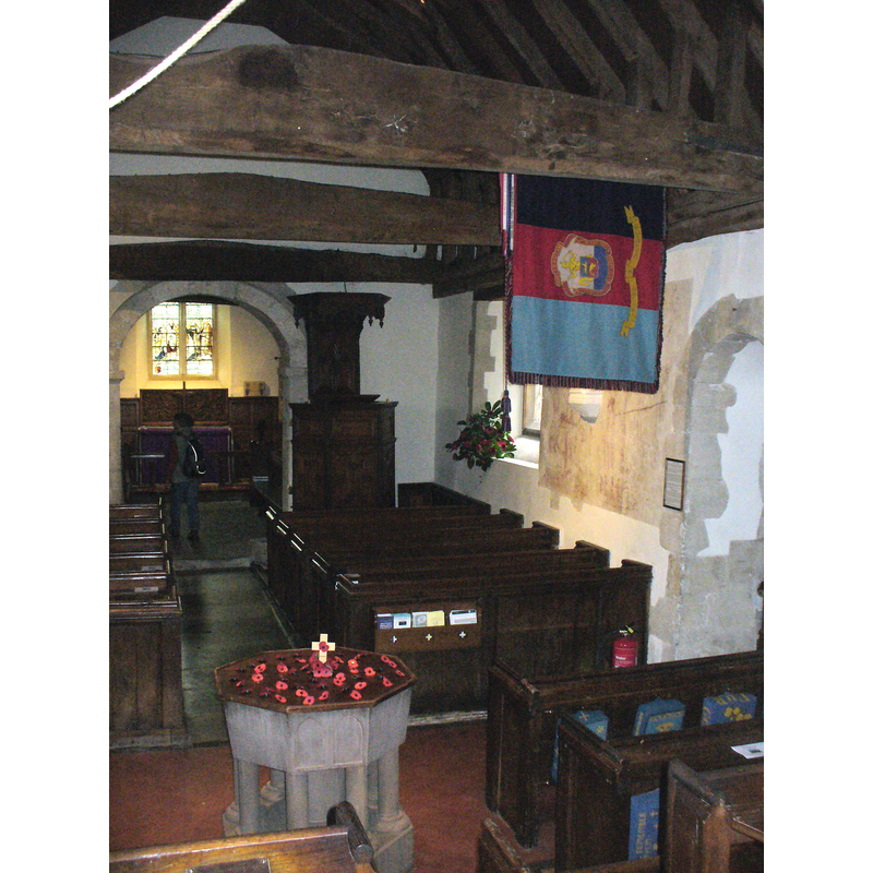 the font at the centre of the nave, in line with the south doorway