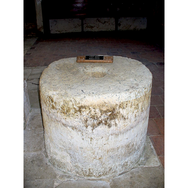 Source caption: "Cylindrical font base from Roman times in Albury's old Norman church. It is about 2 feet high."