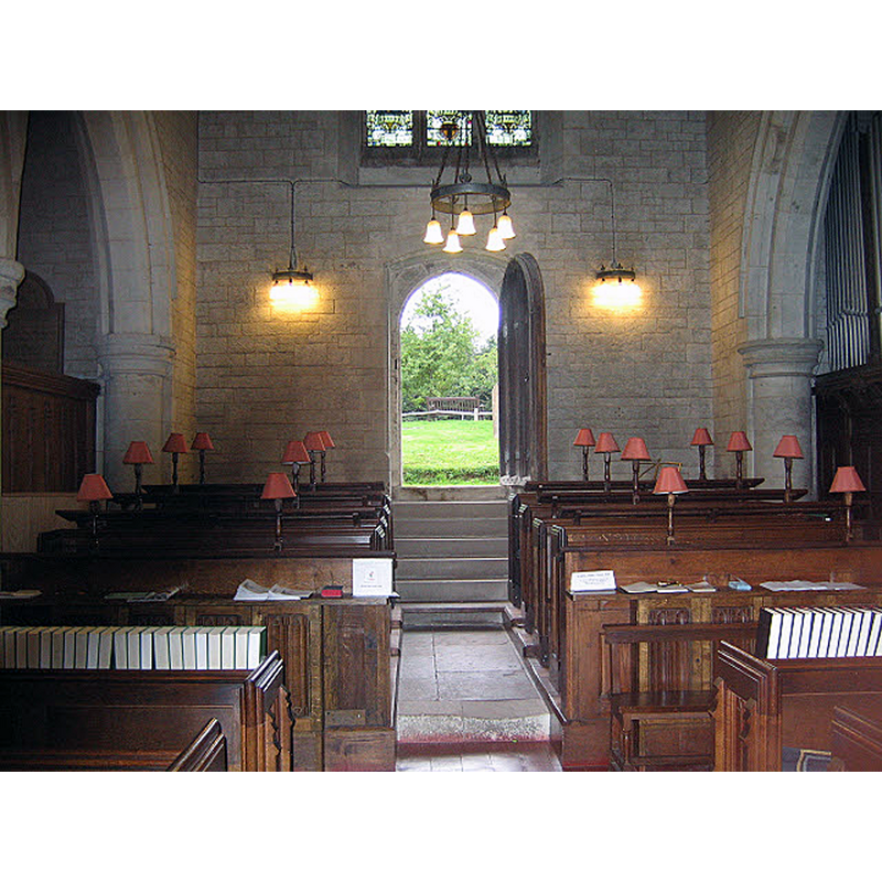 Source caption: "West door of St Margaret's church, Chipstead. Looking towards the ceremonial west door. The door itself is ancient, but was apparently re-set in the 19th century restoration at the present level of the churchyard. The six steps show how much the level of the ground has been raised over the centuries as a result of burials. There is now a step-free entrance to the south side."
