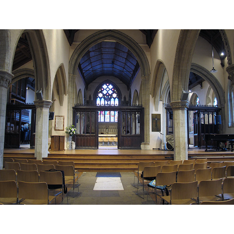 Source caption: "St Mary's, Reigate: nave after reordering. The reordering of the church in 2011 saw the old pews removed and a new, larger timber dais for service leaders, musicians and artistic performances. Permission was sought but refused to relocate the historic wooden rood screen to elsewhere in the church."