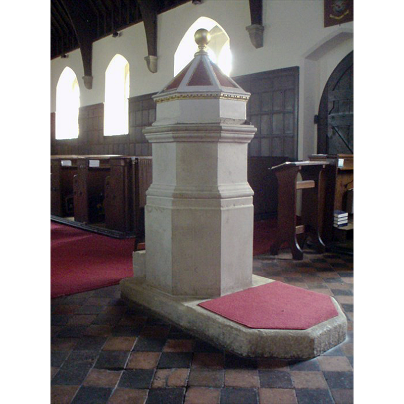 the 19thC (?) font inside the modern church