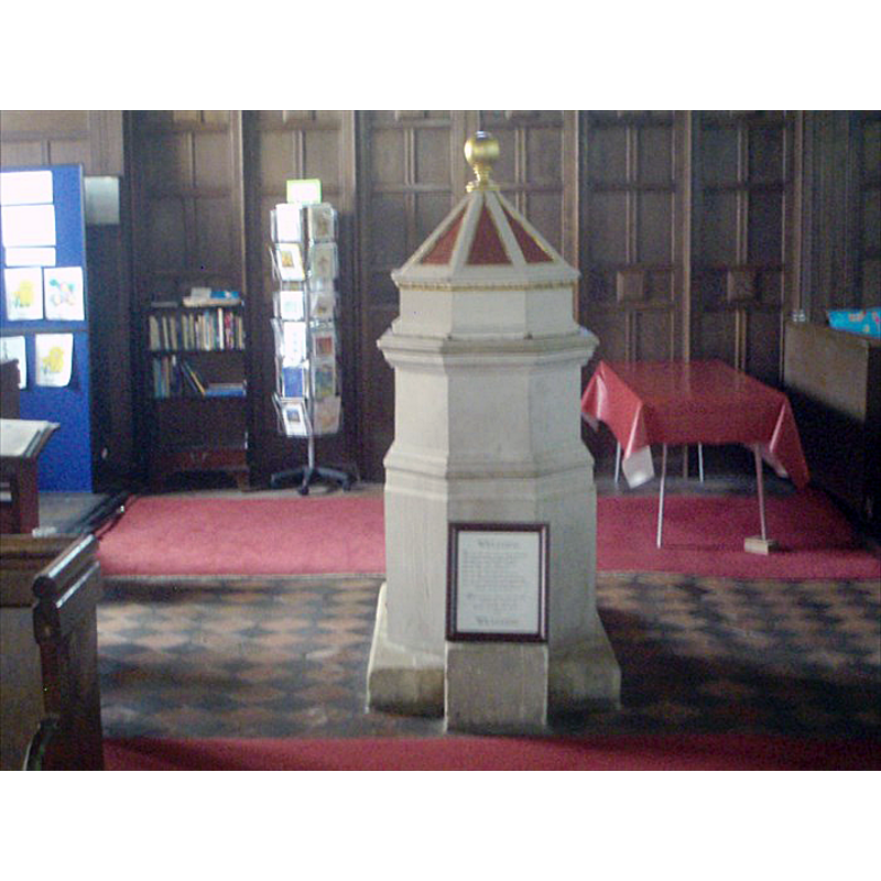the 19thC (?) font inside the modern church