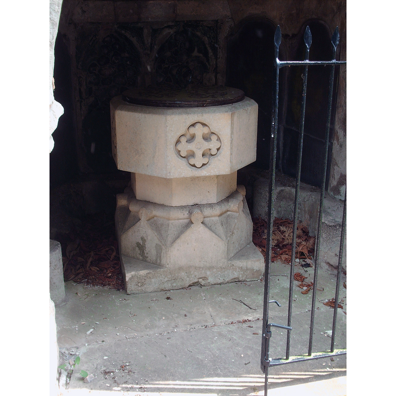 the 18thC (?) font inside the grotto that contains all that is left of the old church [cf. FontNotes]