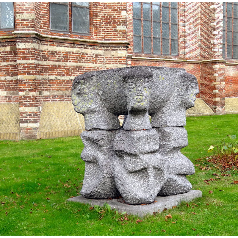 the modern font as displayed in the churchyard, November 2012 -- it is clearly inspired by the medieval font designs in this area