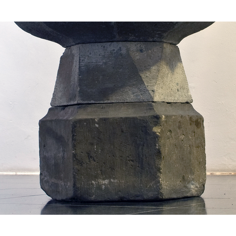 the two parts of the base are probably a composite arrangement, the original base missing