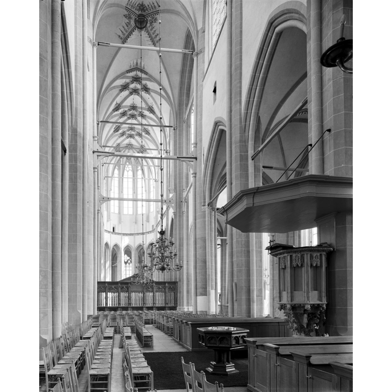 with the font visible in front [south] of the pulpit