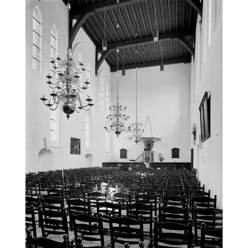 a baptismal font and its cover are partially visible at the far back, to the left [north] of the pulpit