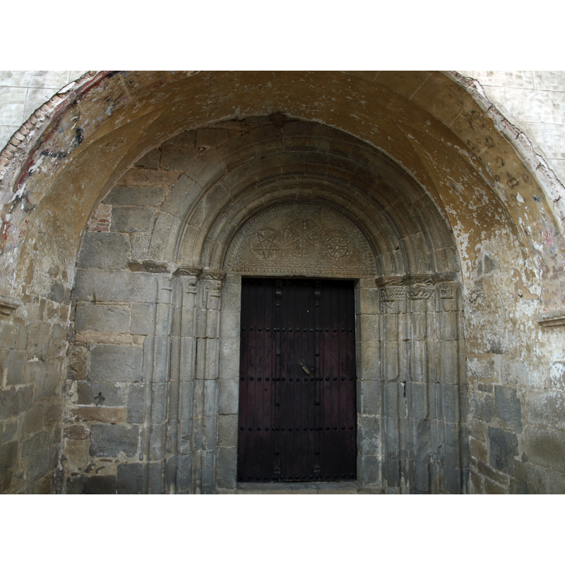 the capitals of this portal appear to be on the theme of the Adam and Eve and the Fall