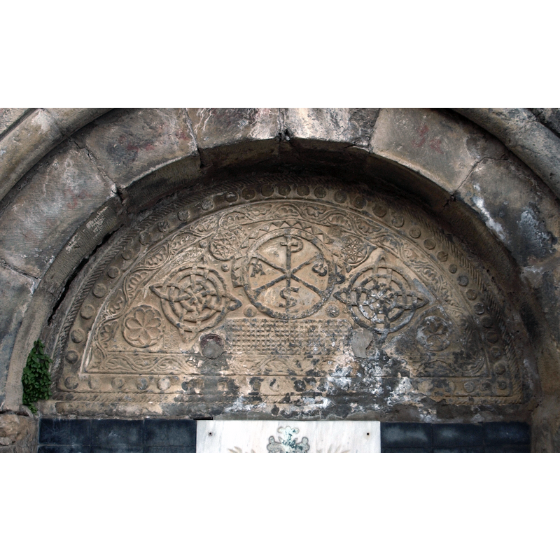this tympanum, from the disappeared Ermita de San Martin, shows many of the same details as those on the south portal of La Asunción, and must have been made by the same artist or workshop