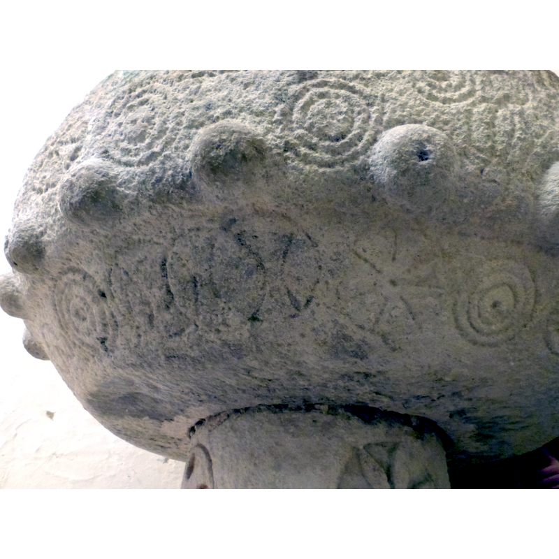 a row all around the lower part of the basin; some are perforated [cf. FontNotes]