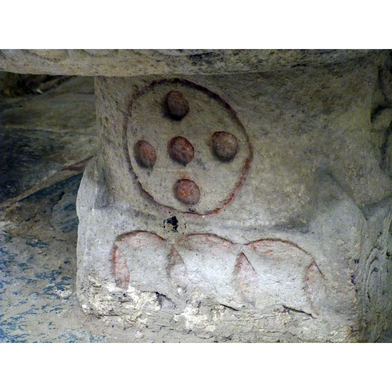 on the stem of the base -- made of five round circles arranged in cruciform manner [cf. FontNotes]