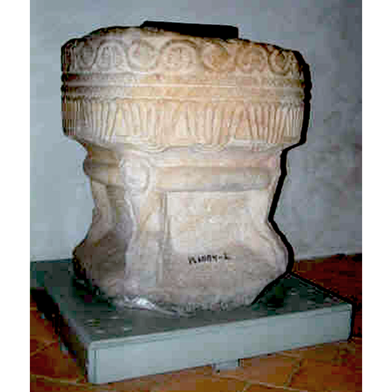 very worn; at 90-degree angles on the base