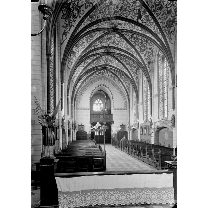 the top of the font and the conical cover are visible at the far [west] end, right [north] side
