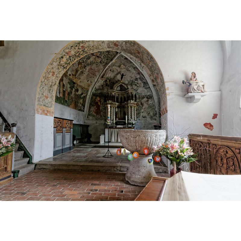 with the old font in the foreground -- before the ca. 2020 restoration, at which time themedieval font was moved to the tower space and the later font brought to this location instead