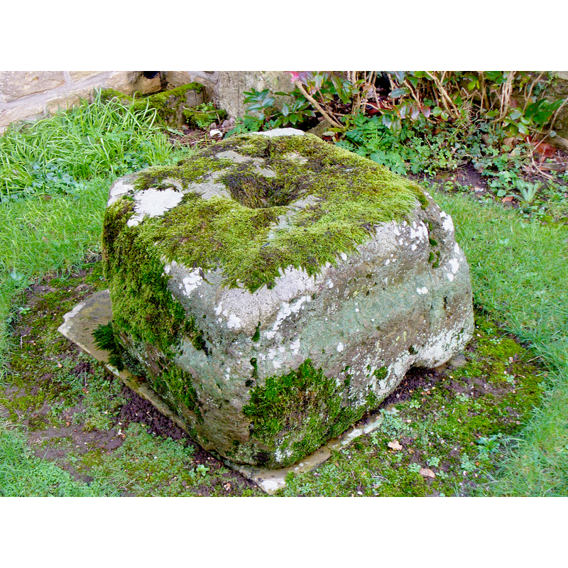 as found on 10 January 2016 outsid, by the porch of the church -- is this what the VCH described in 1911?: "The old font is at present turned upside down, and placed as a mounting block outside the vicarage. It may shortly be restored to the church."
