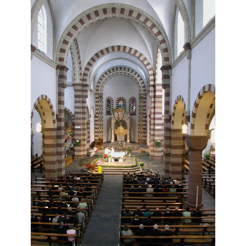 the font and cover are visible in the chancel, behind the new altar
