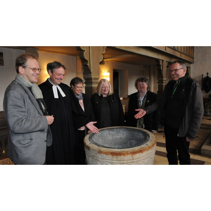 an ecumenical celebration over the font at the Evangelisch-lutherische St. Georg Kirche, Badbergen