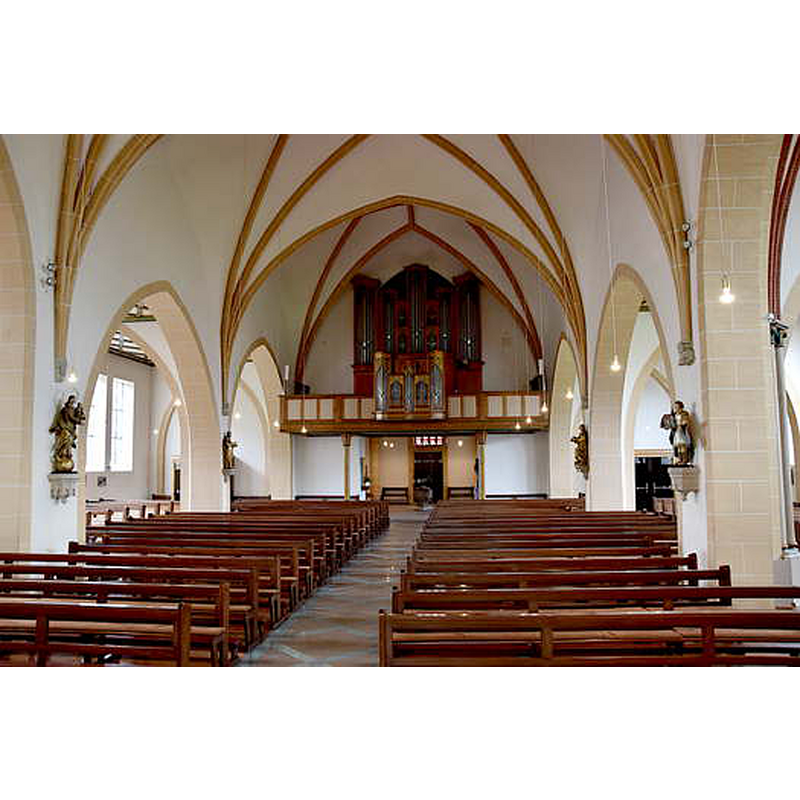 the old font is visible at the far [west] end of the centre aisle