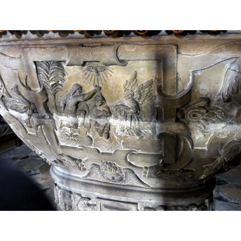 the scene is framed in an ornate rectangular panel
