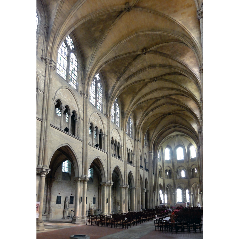 the object in partial view in the foreground is a holy-water stoup located at the west end of the nave