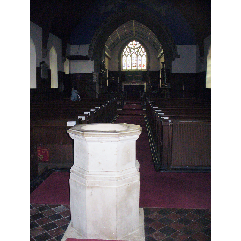 the 19thC (?) font inside the modern church, at the west end of the nave