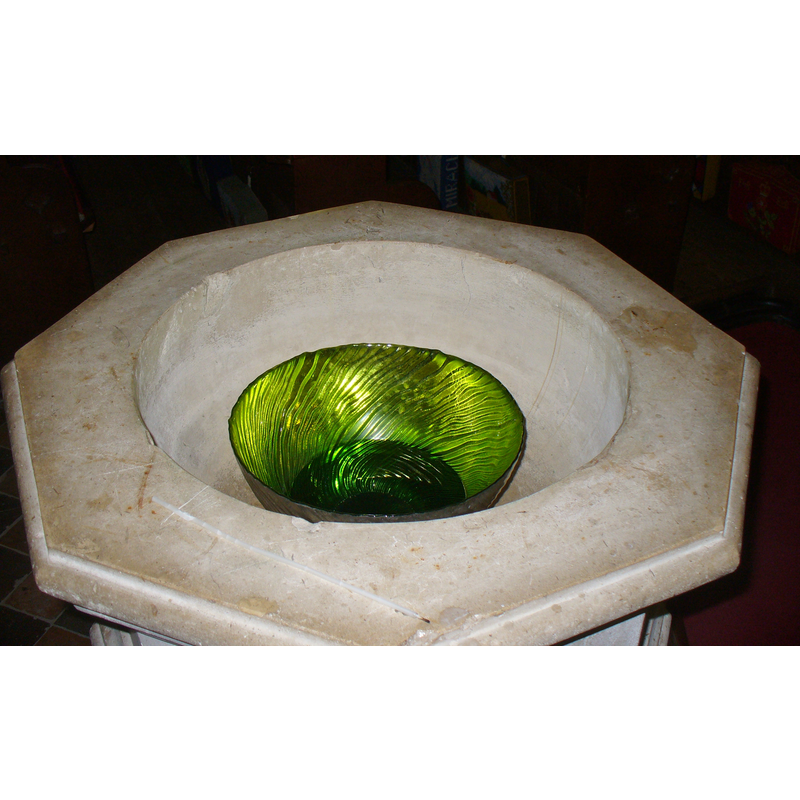 the 19thC (?) font inside the modern church