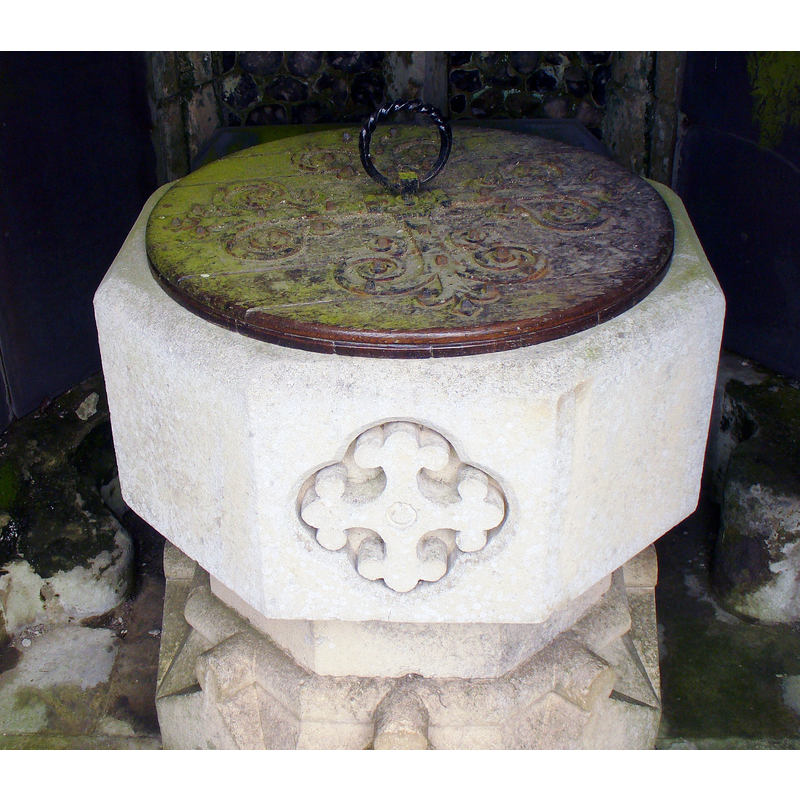 the grotto that contains what remains of the old church as well as an 18thC (?) font [cf. FontNotes]