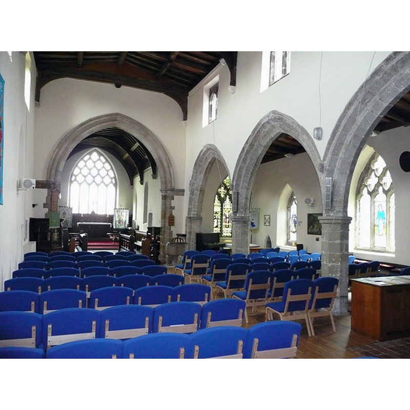 the font and cover are visible at the east end of the nave, south side, just west of the chancel south pillar, not a common location in an English church
