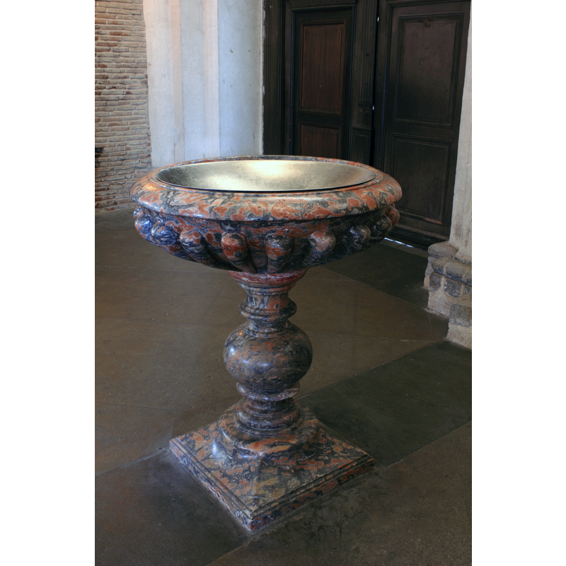 one of the modern stoups in the basilica