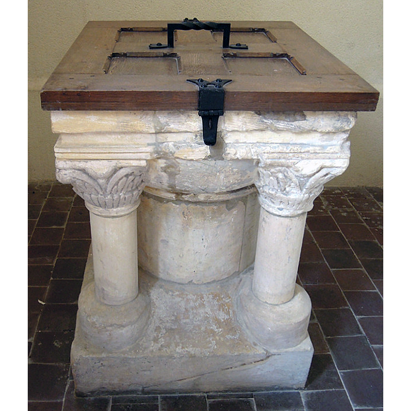 post-1918 (?) restoration -- notice the modern font cover, the repairs, the new angle colonnettes, the re-tooled bases, etc.