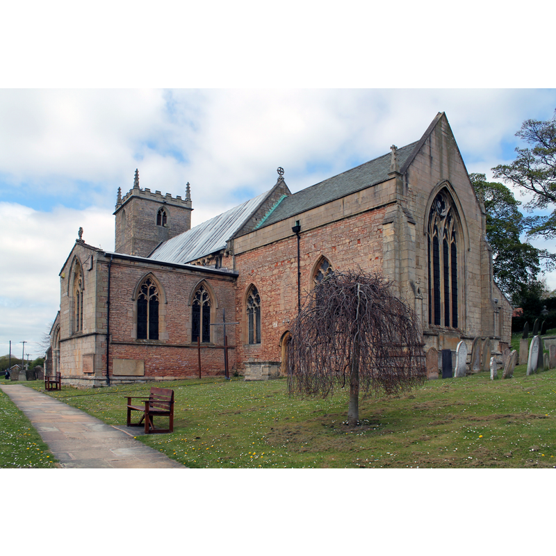 Source caption: "The church dates from the 12th century onwards [...] The font is probably older than the church and may have been transferred from an original, previous building."