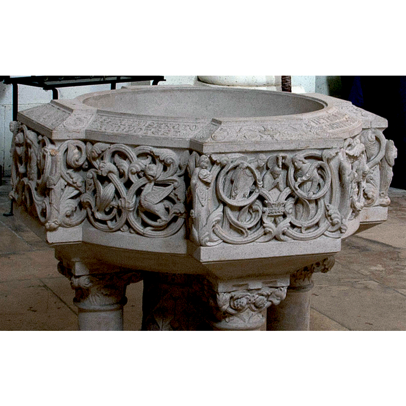 the modern font: the lovely carving harking back to some of the best art on medieval fonts