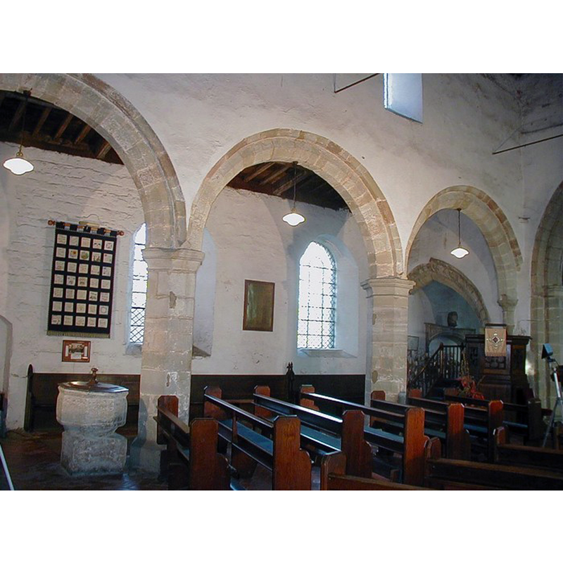 the old font by the north aisle arcade pillar