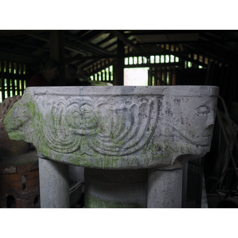 one of two, but quite different from the other; this one is located to the right of the pair of intertwined dragons