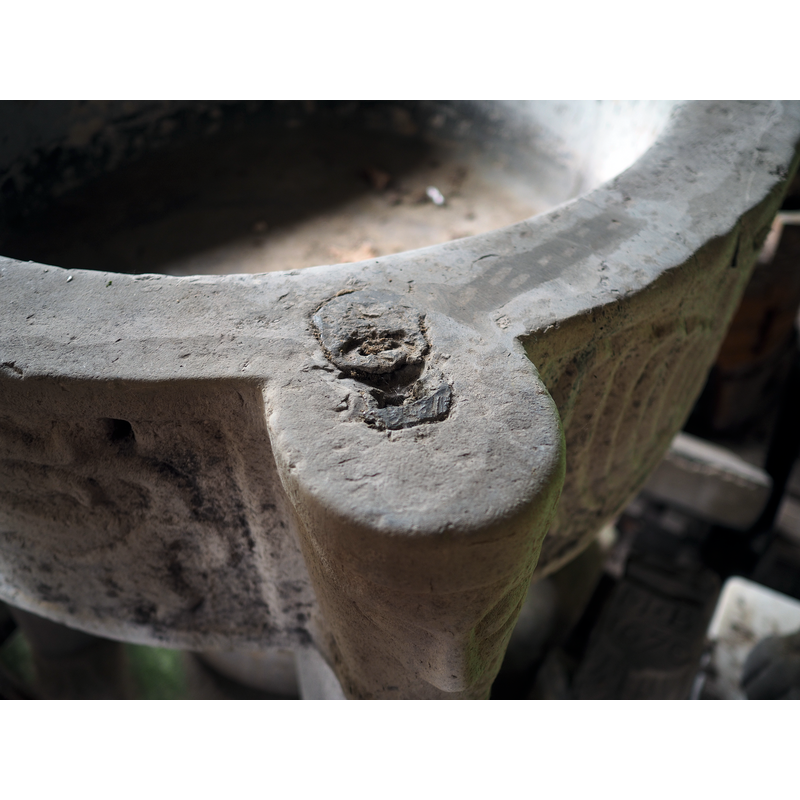 showing the anchoring spot for an old font cover; the one at the opposite end is broken