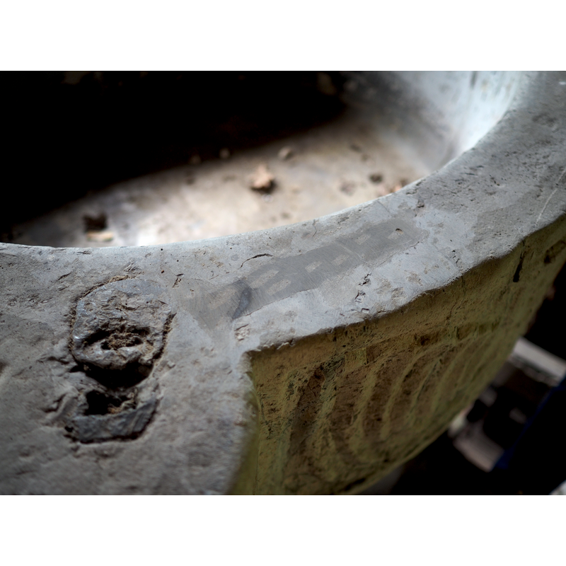 a close-up look at the anchoring spot for an old cover