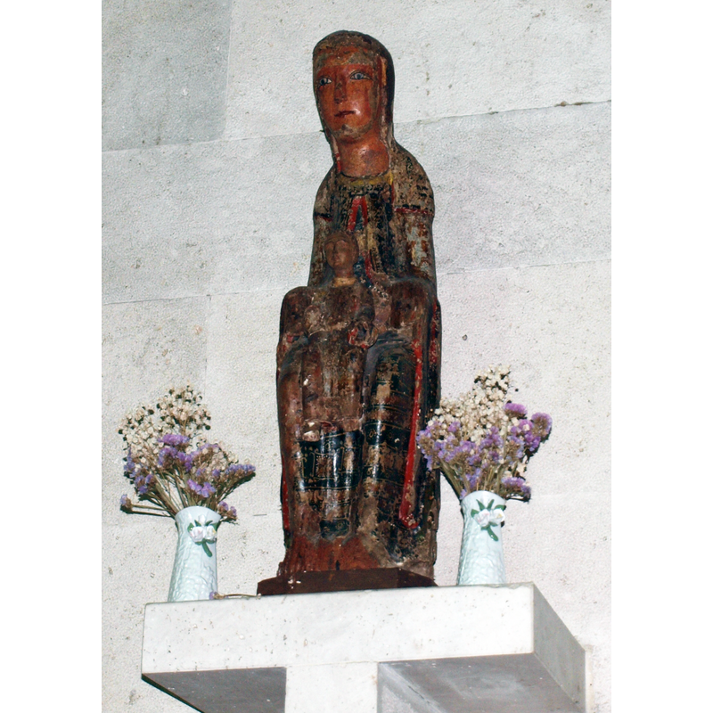 12thC Madonna and Child originally from the iglesia del Monasterio de Santa María de la Armedilla, now in ruins; the statue is now at the nearby parish church of Cogeces del Monte