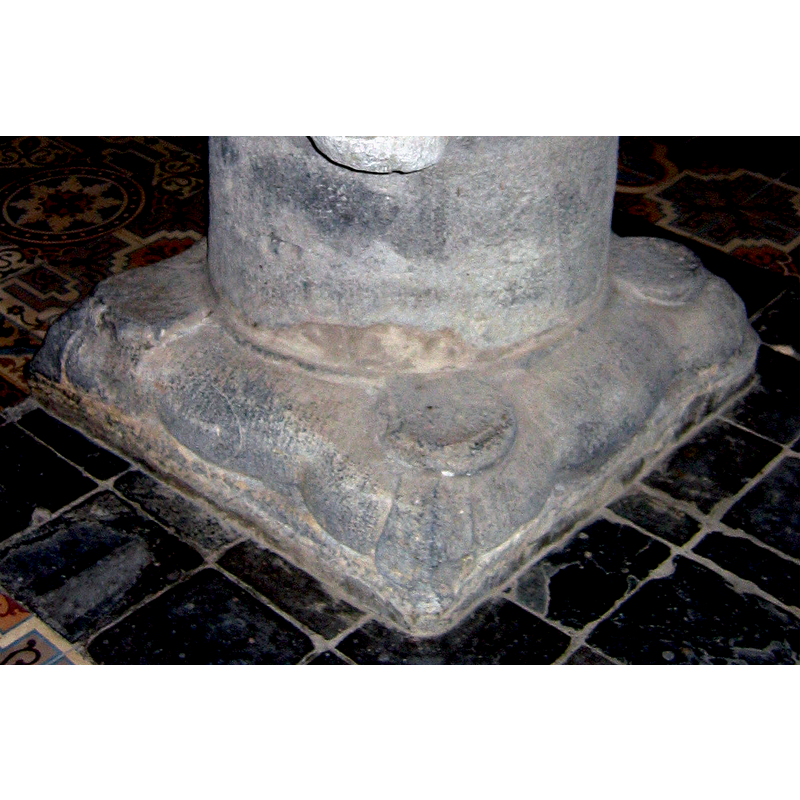 at the angles of the lower base