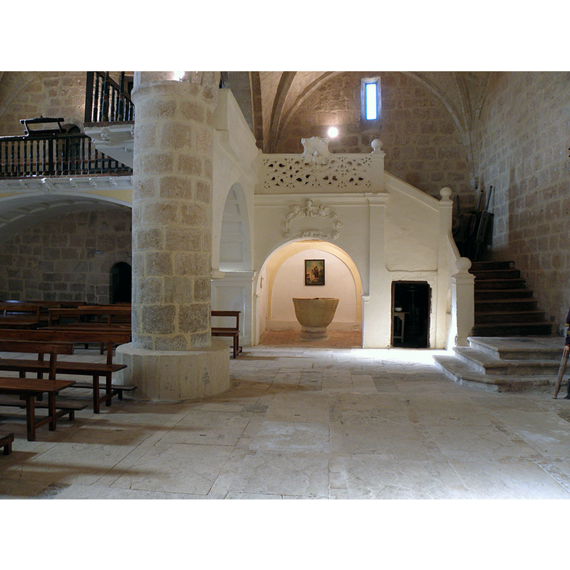 the baptistery has been created beneath the west gallery and the stairs leading up to it