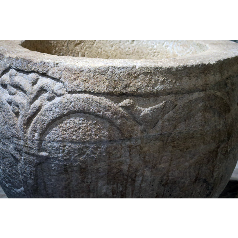 showing two of the decorated spandrels; the vegetal motif exceeded the available space but thr carver invaded the flat moulding at the upper rim