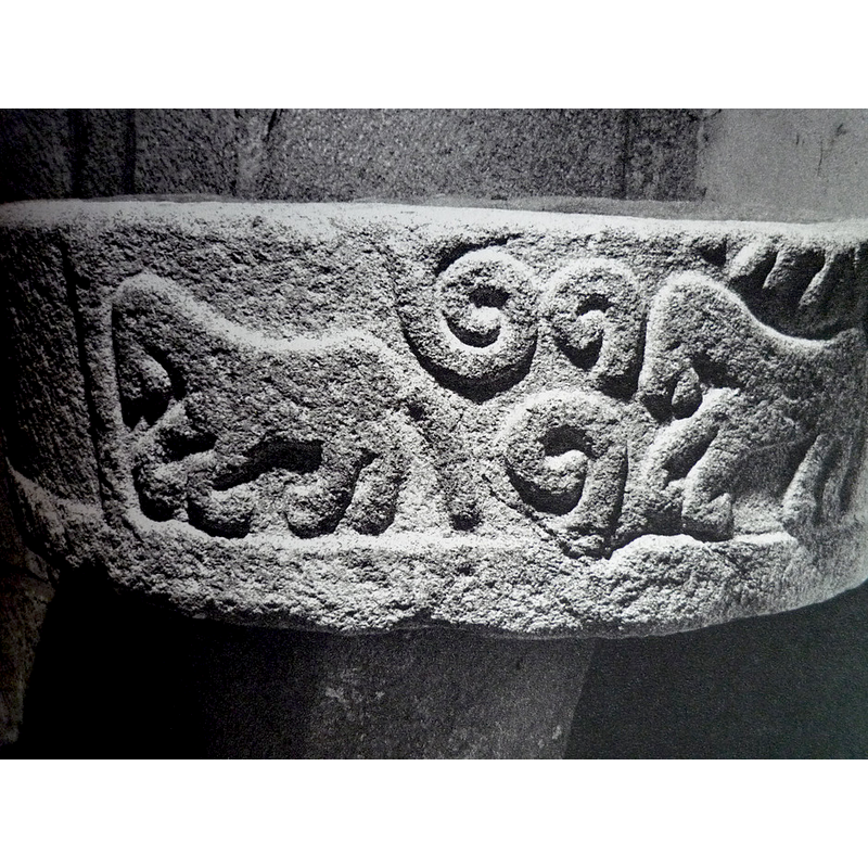 several of them; crude carving on coarse granite