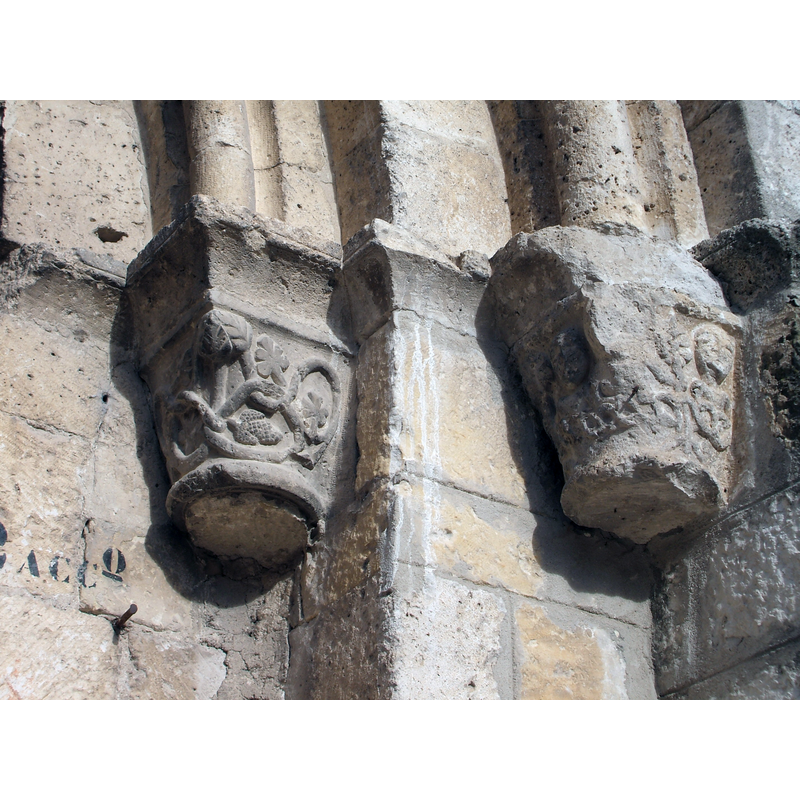 capitals on the right side of the portal