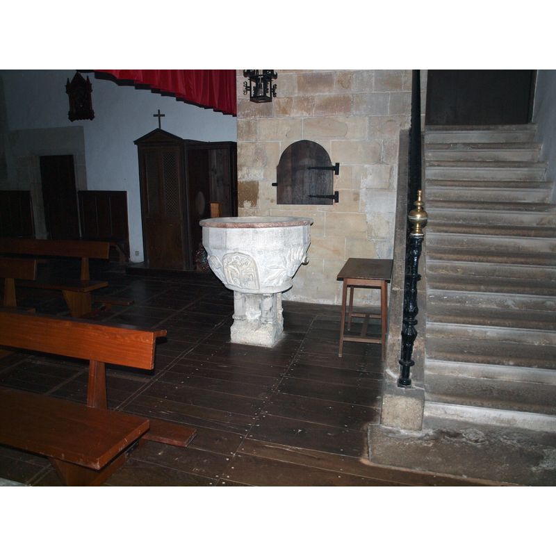 the font standing to the left [south] side of the gallery stairs
