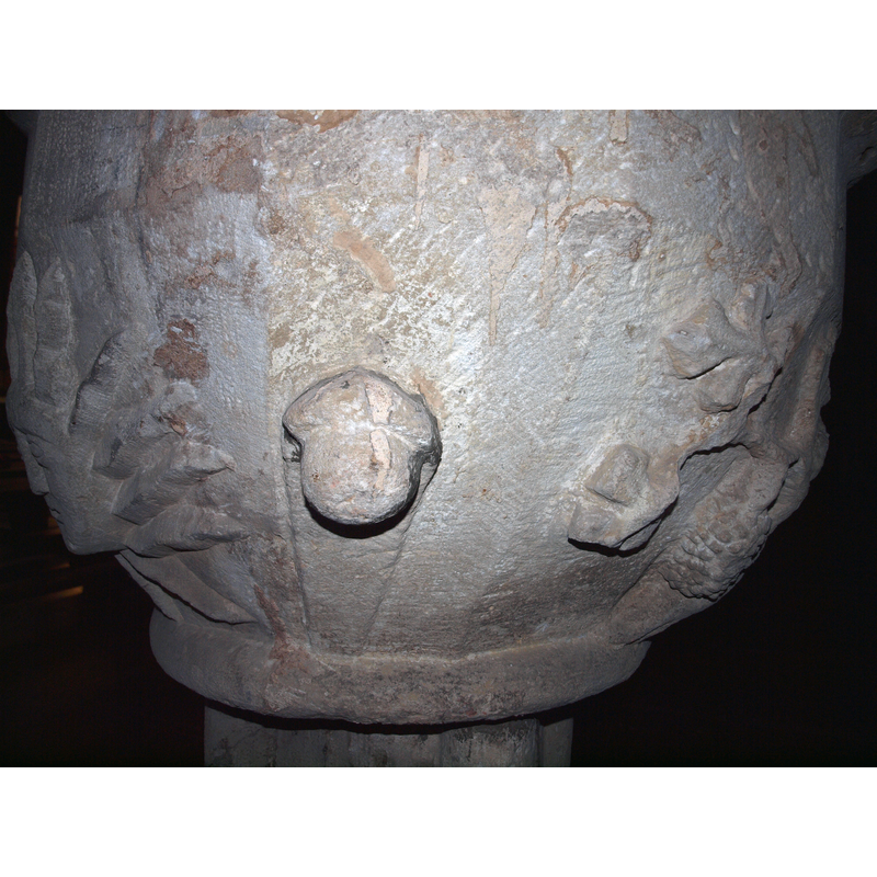 on the northwest side of the font [orientation is approximate]