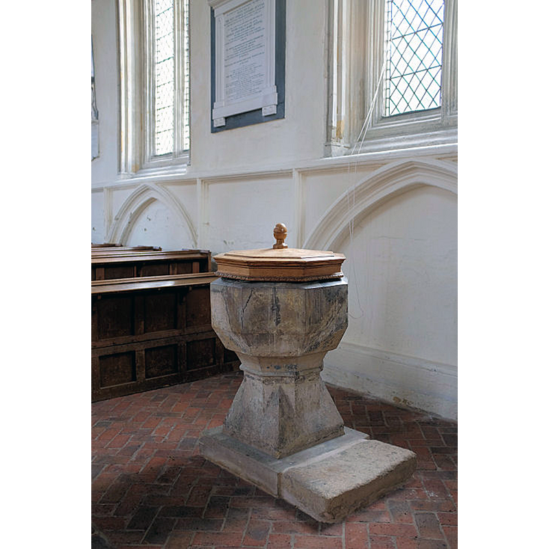 at the west end of the south aisle