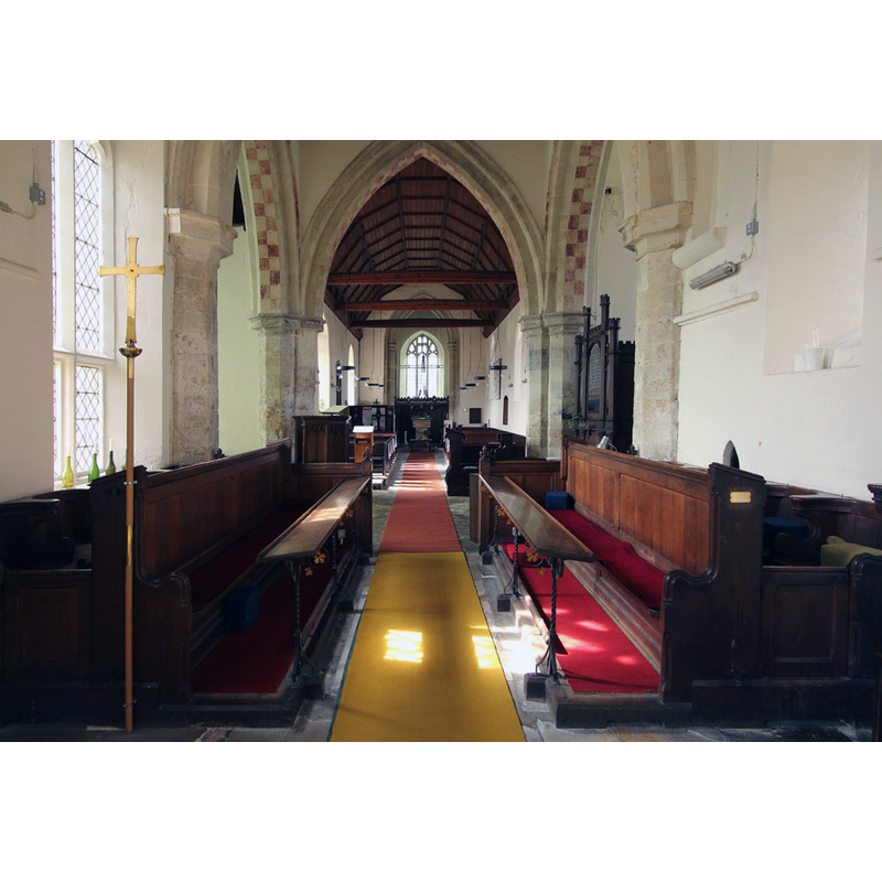 the font is discernible at the far [west] end of the centre aisle