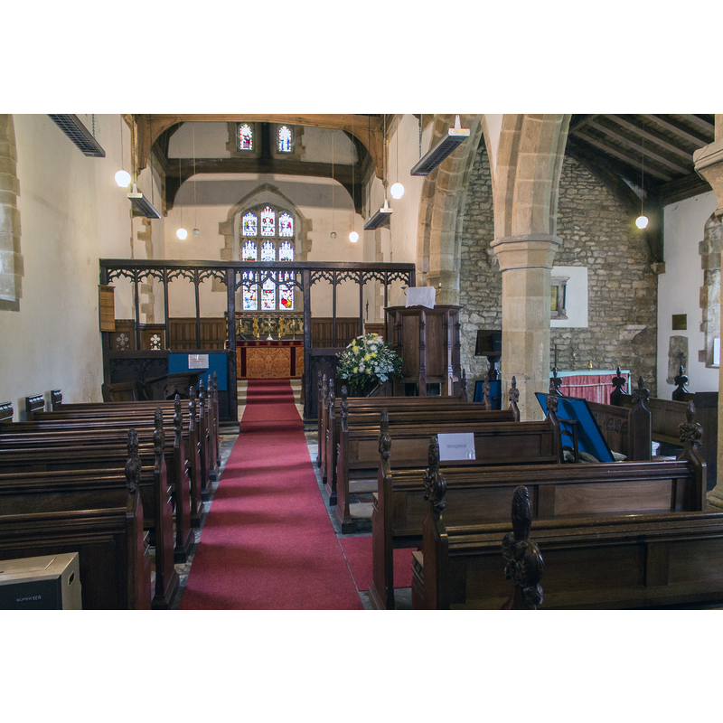 Source caption: "Interior, Ss Peter & Lawrence church, Wickenby. The first record of a church on this site appears to be about 1100AD. Today's church is a combination of C12 through to C19 alterations. The south arcade dates back to C13. The screen and distinctive ogee headed piscina are medieval. The font is believed to be of Saxon origin."